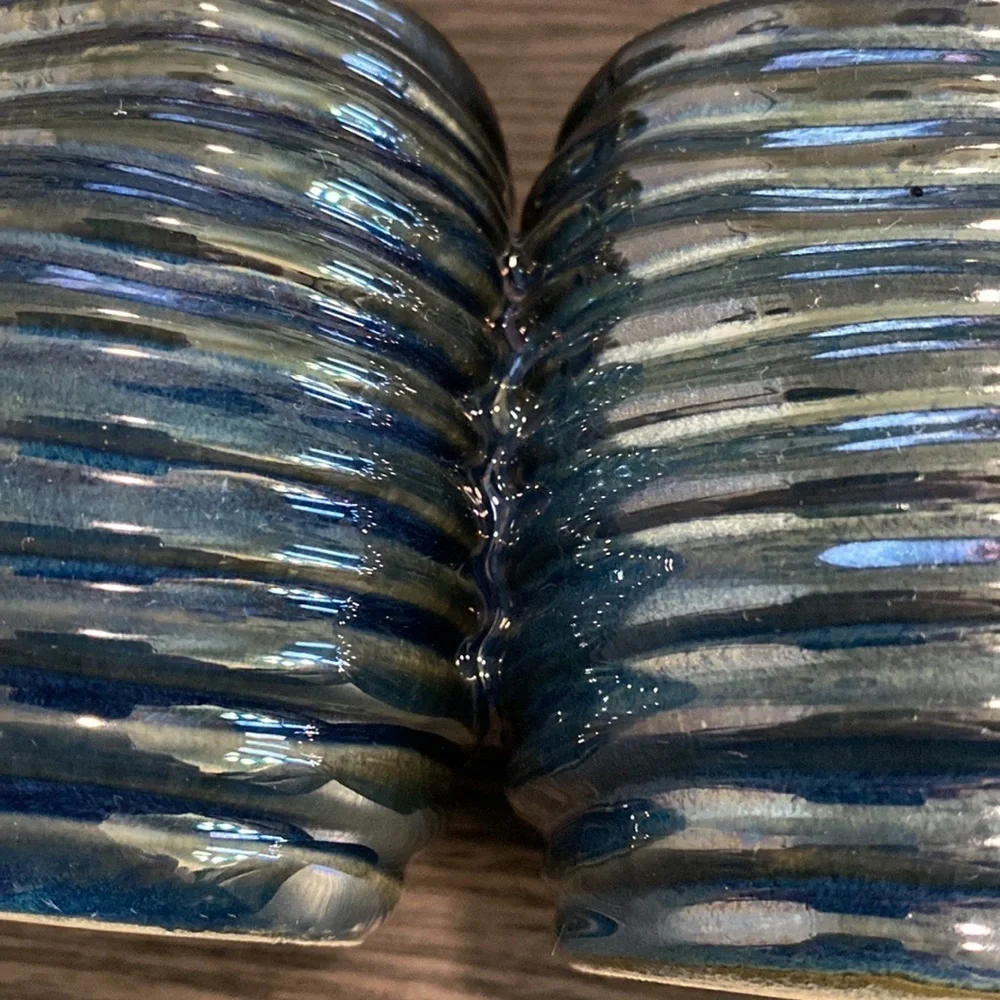 Decorative  clay, metallic blue container. 3 combined vases/cups.